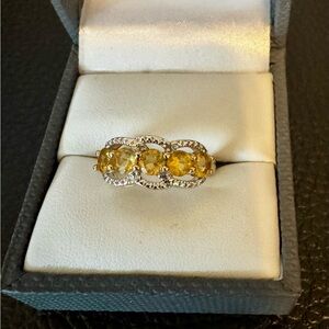 .85CTW Yellow Beryl W/.03CTW White Diamond Accents 18K over Silver. Sz 7.